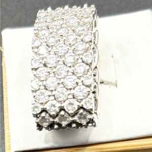 Size 7.5 Elegant Sterling Silver,flexible ring with multiple sparkleing  CZs